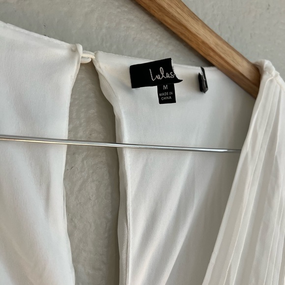 Embrace Your Beauty Ivory Pleated Long Sleeve Skort Romper - Picture 6 of 9